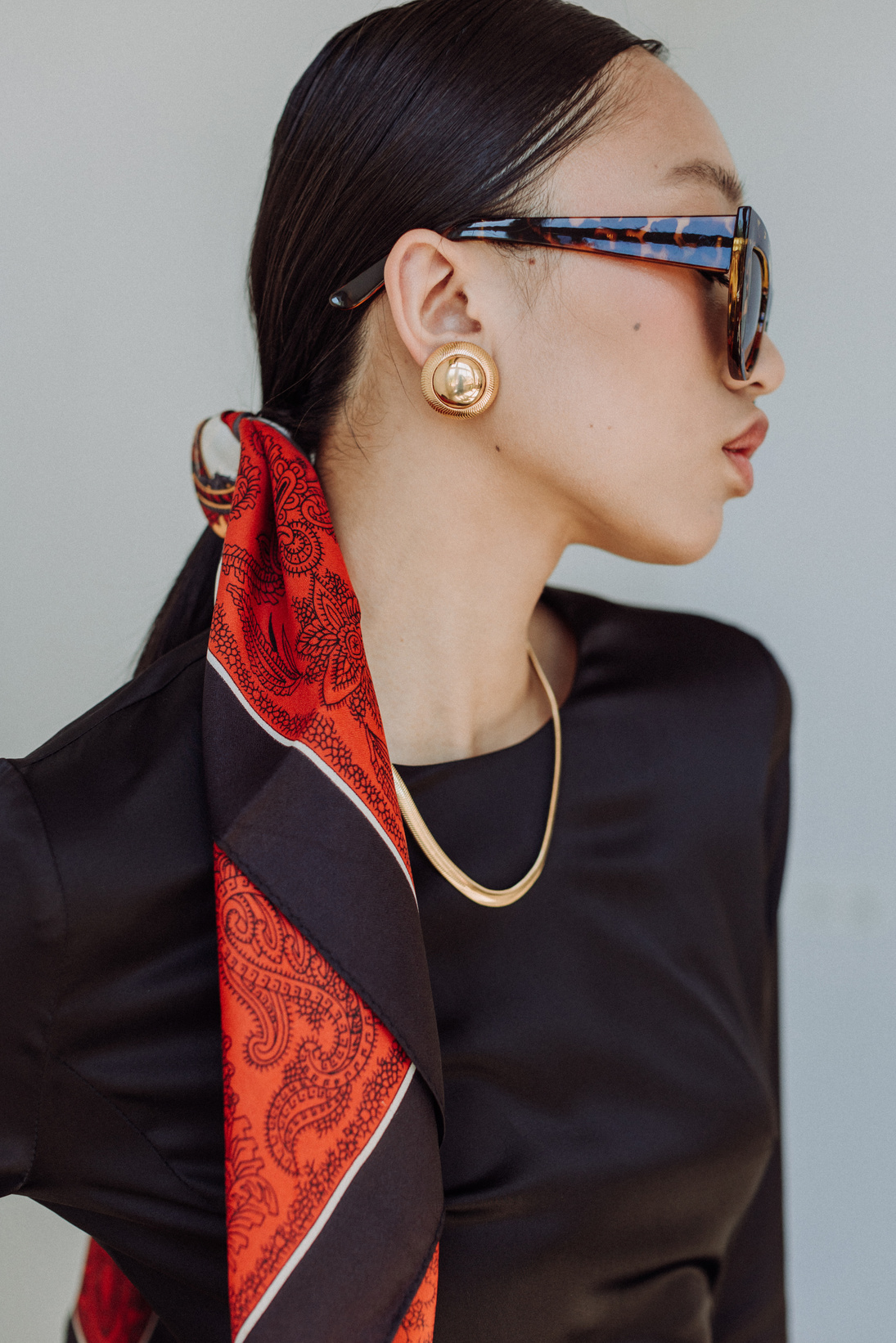 Stylish Woman in Scarf and Sunglasses